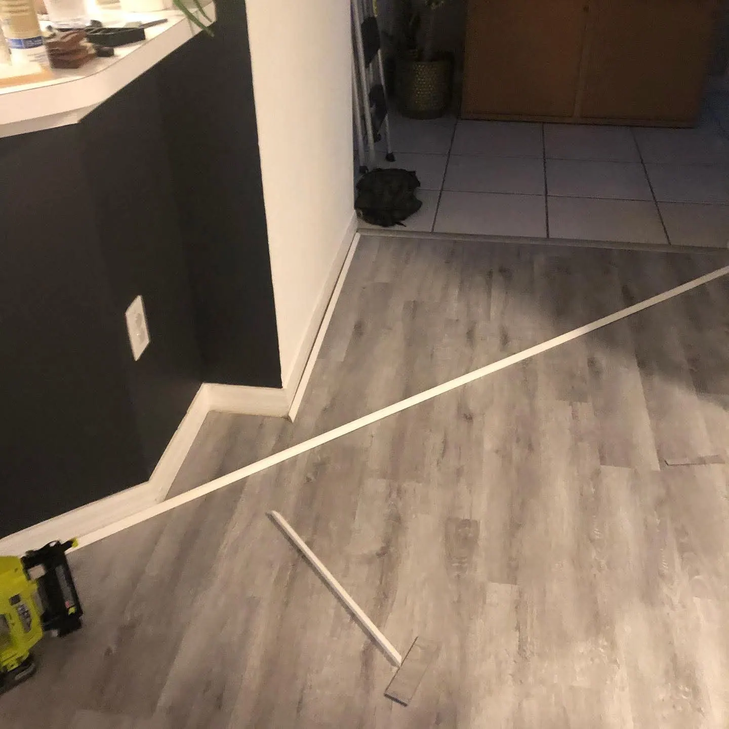 Light laminate flooring installation by PalmPro