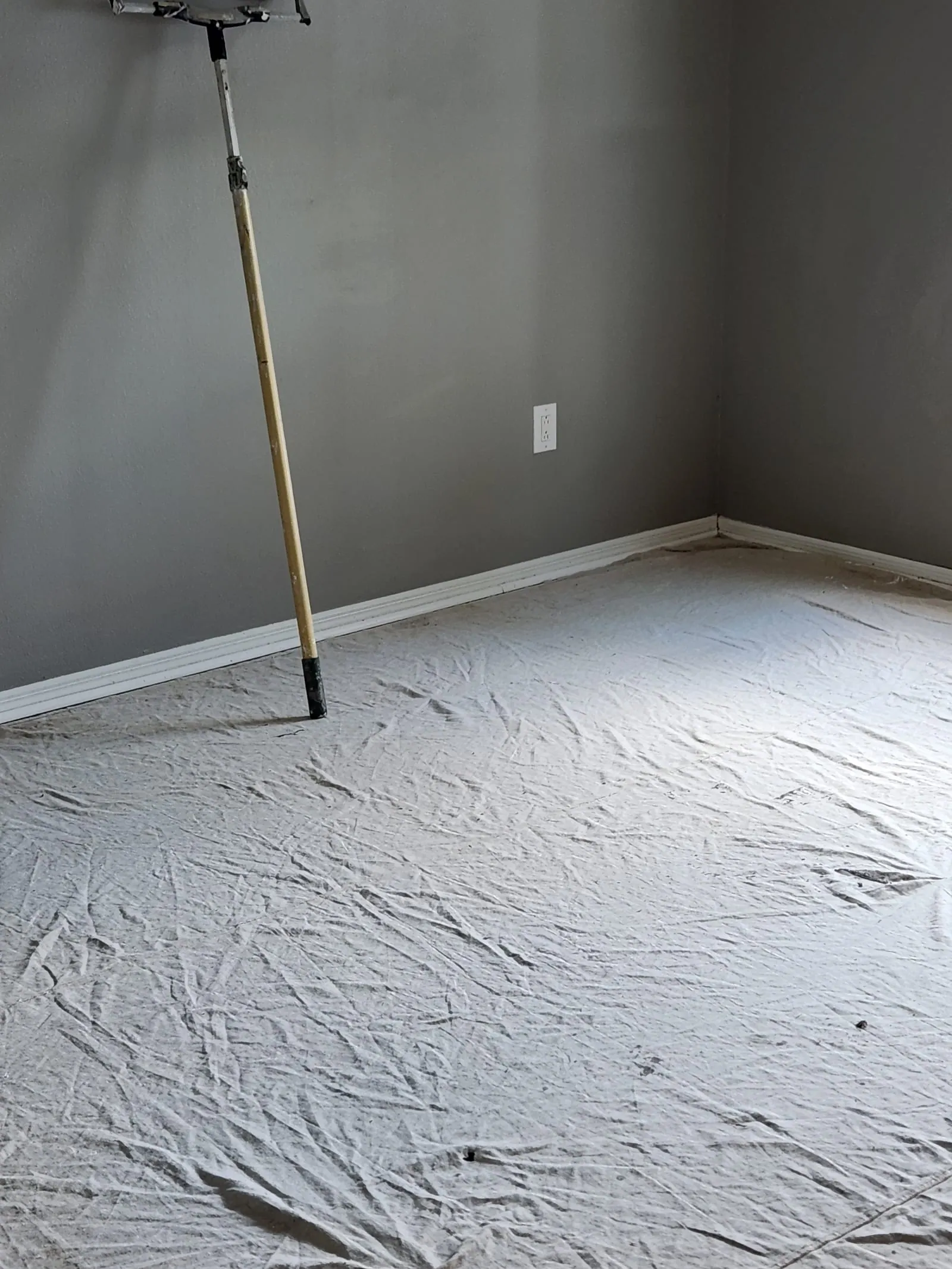 PalmPro protecting flooring during interior painting